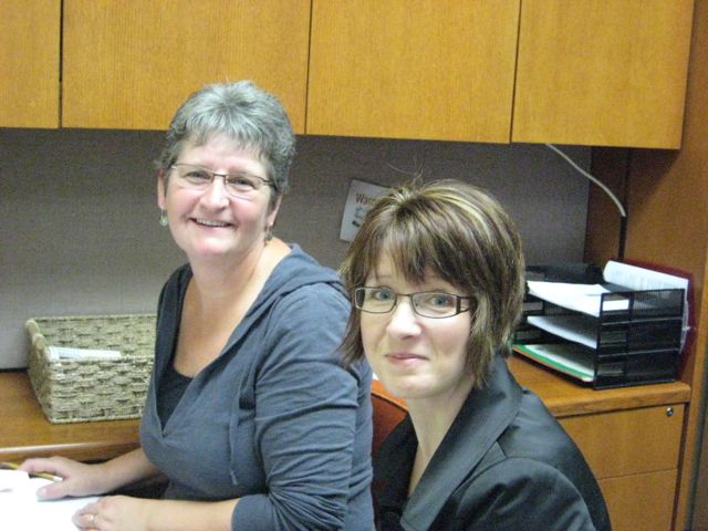Melanie orienting Carolyne Nickel at Bergan and Associates Counseling in Winnipeg, able to answer questions about how counselling works.